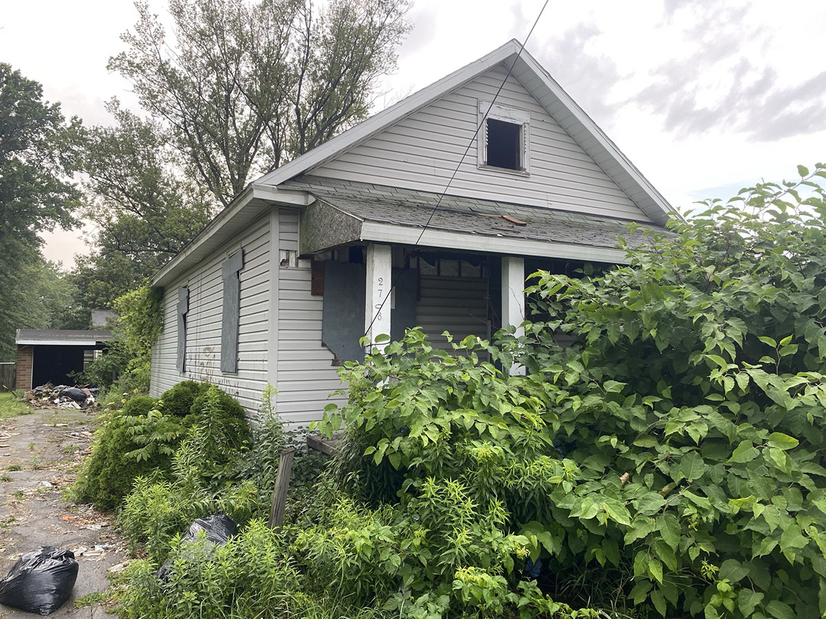 blighted home in erie pa in need of rehabilitation